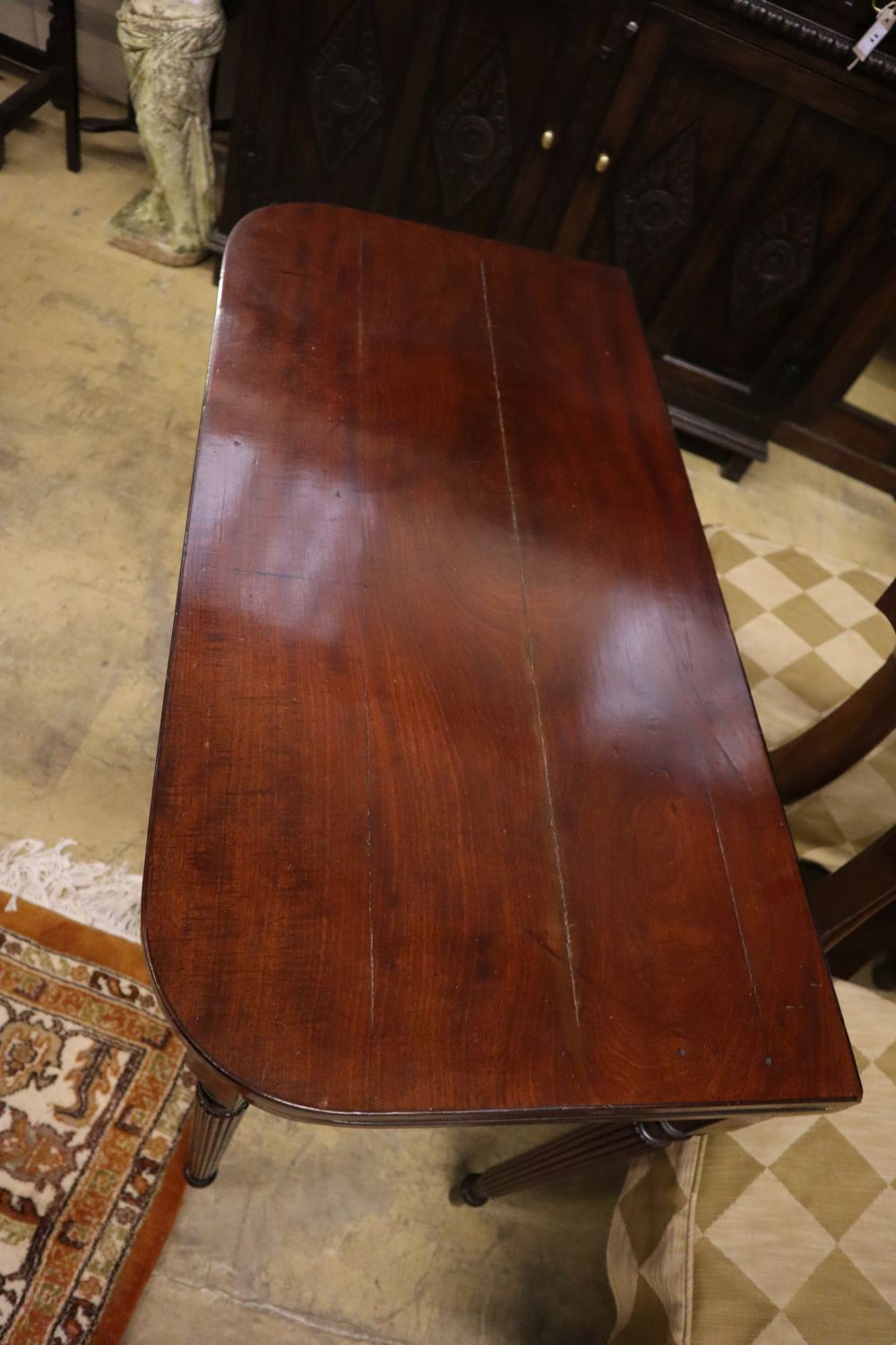 A Regency mahogany folding card table, width 91cm, depth 45cm, height 75cm
